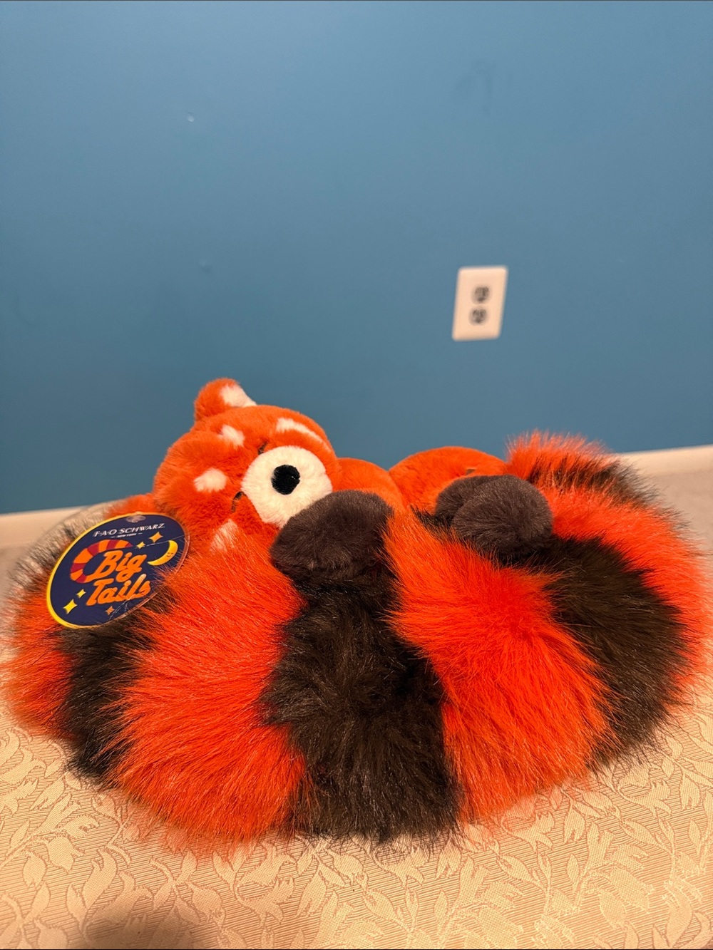 BNWT FAO Schwarz Orange and Black Sleeping Red Panda Plush.